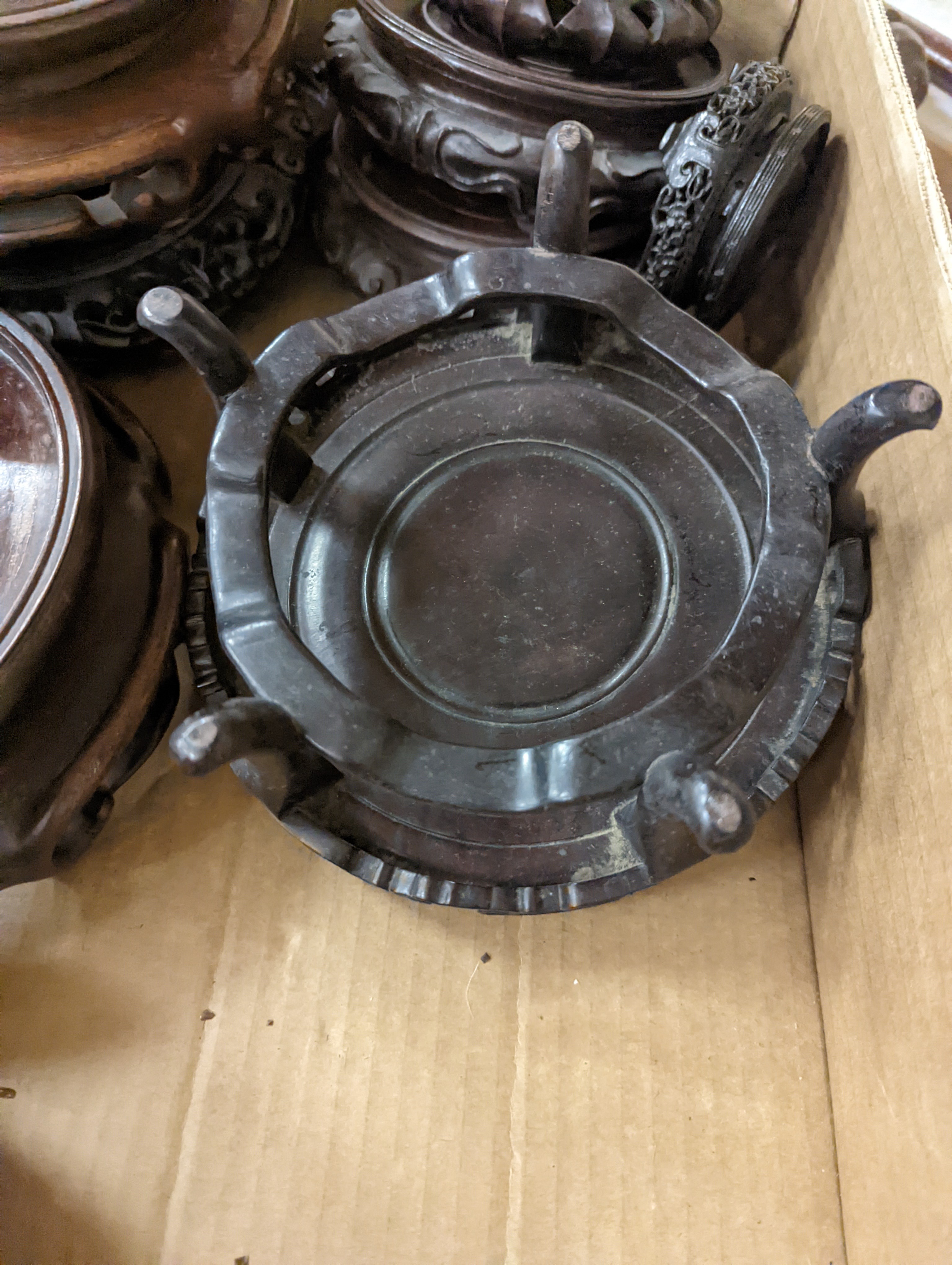 A collection of Chinese stands and bases, 1 box